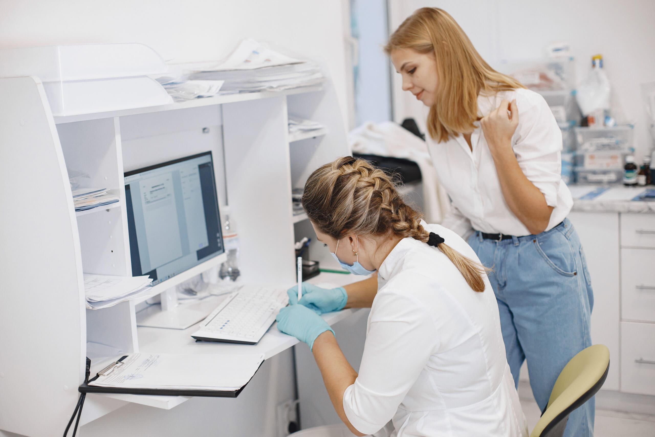 Doctor checks coronavirus test with patient